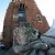wieża ratuszowa kraków, wejście do wieży ratuszowej, lwy na rynku krakowskim - Lew przed wieżą ratuszową
