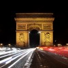 zdjęcie paryskiego łuku triumfalnego nocą - Łuk Triumfalny